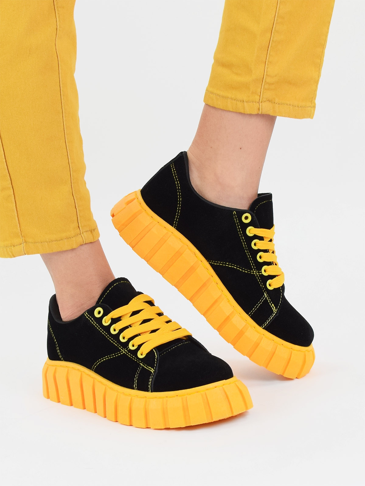 Chunky sole trainers in black & yellow