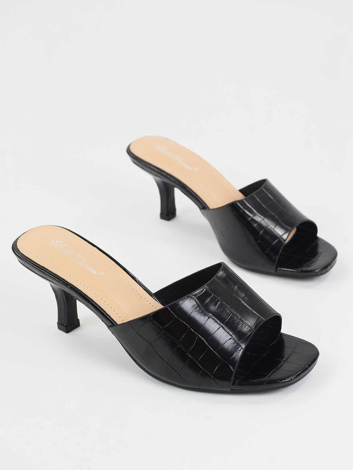 Mid heeled mule sandals in black