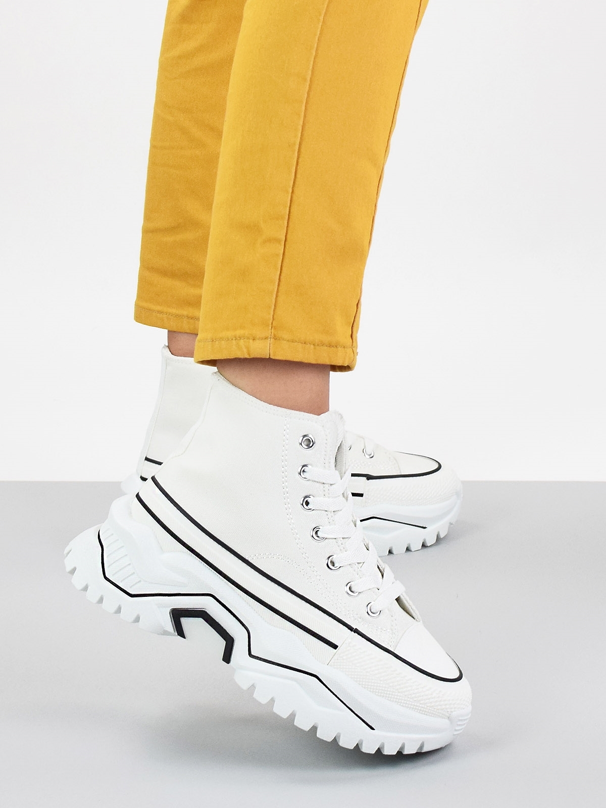 Lace up chunky sole trainers in white