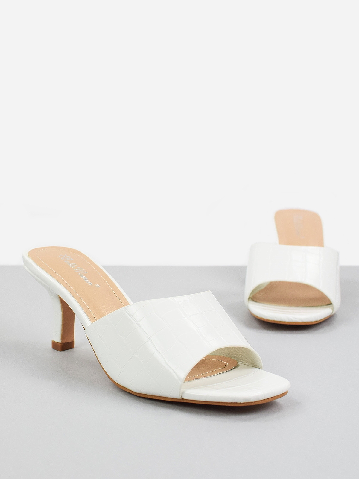Mid heeled mule sandals in white