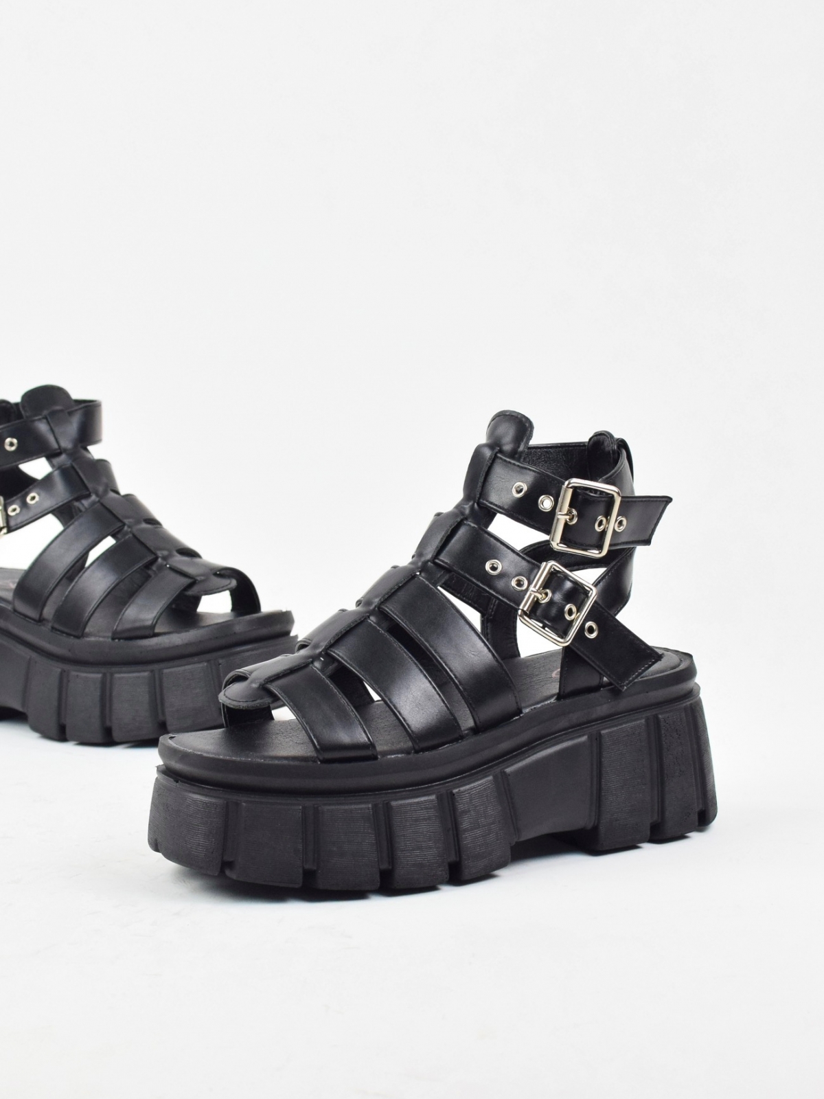 Chunky open toe caged platform sandals with buckle straps in black
