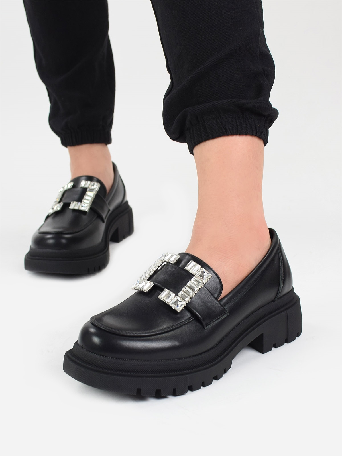 Chunky loafers with crystal buckle in black