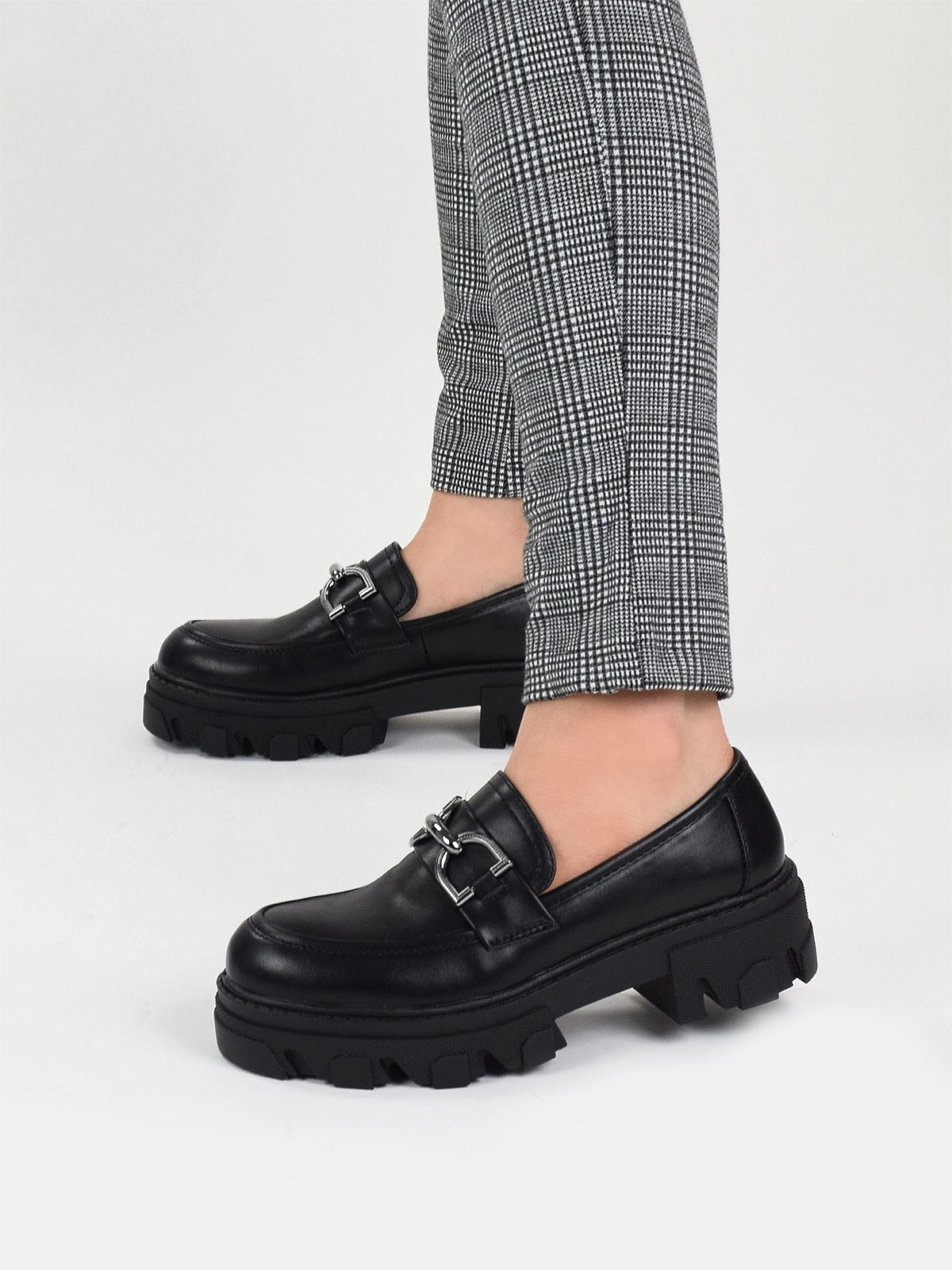 Chunky loafers with silver snaffle detail in black
