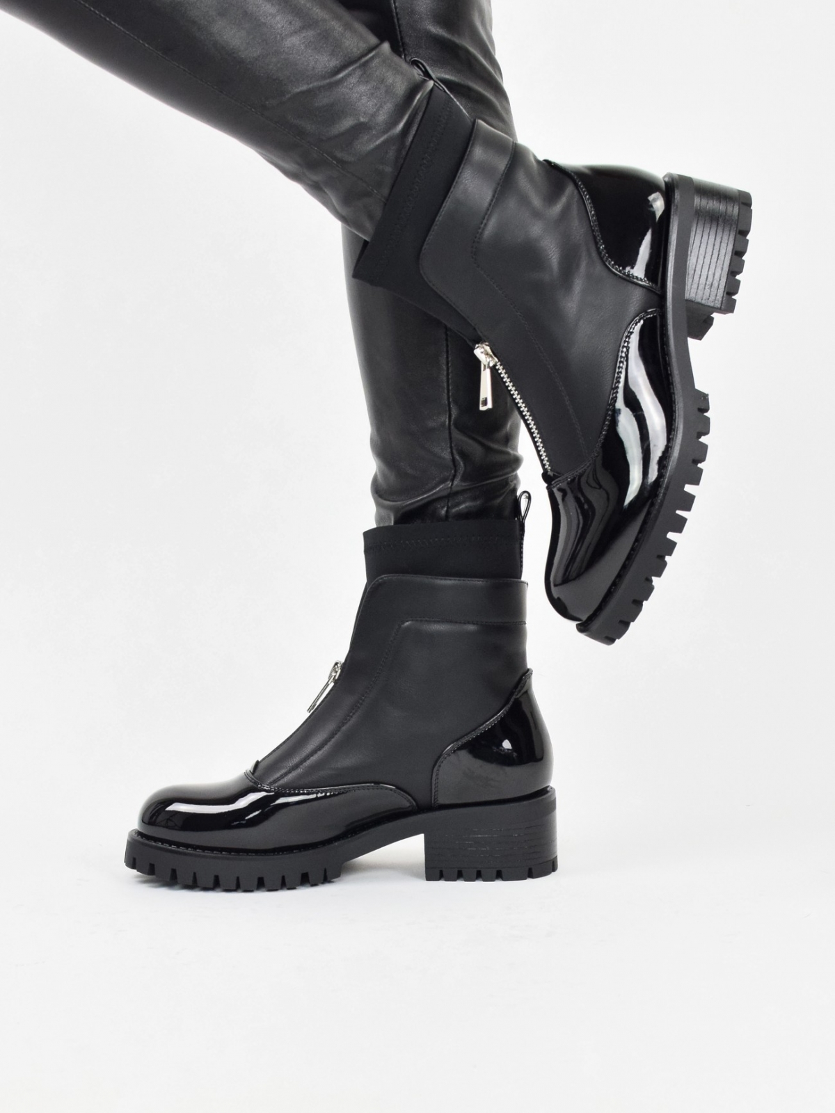 Ankle boots with front zipper in black