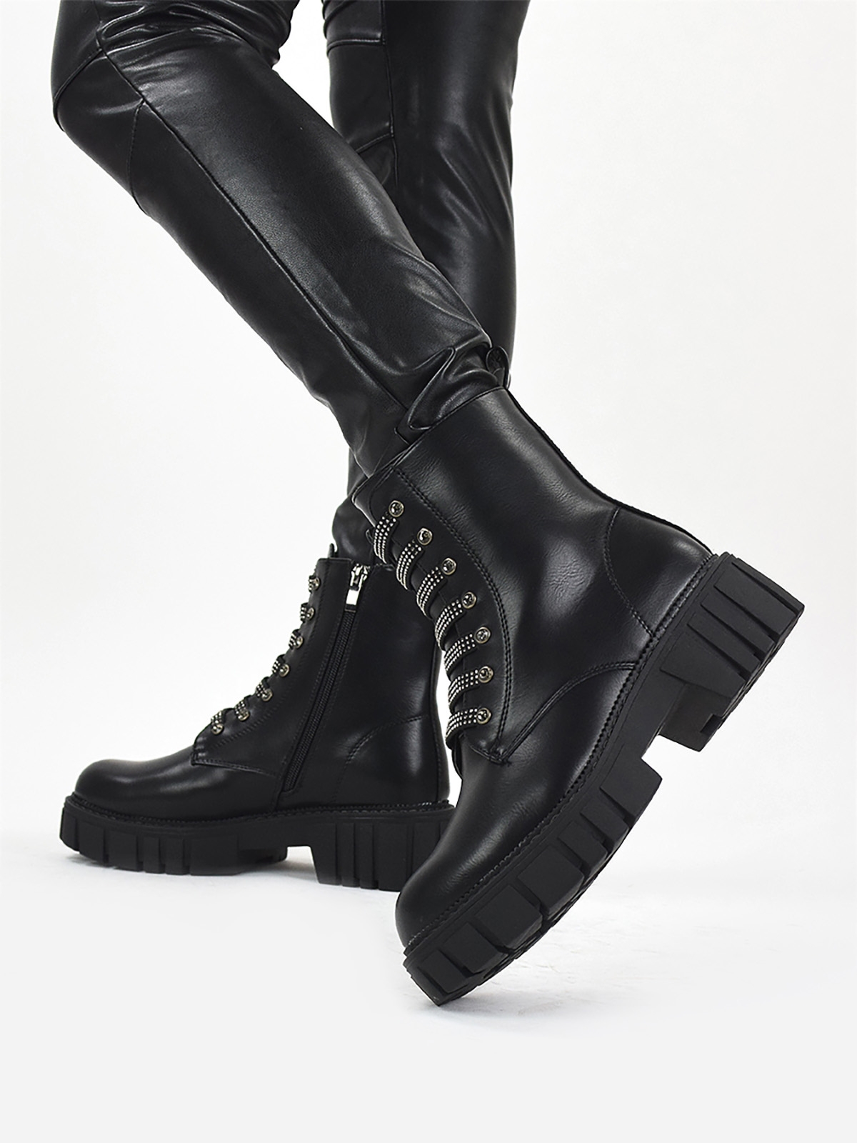 Chunky ankle boots with front metal details in black