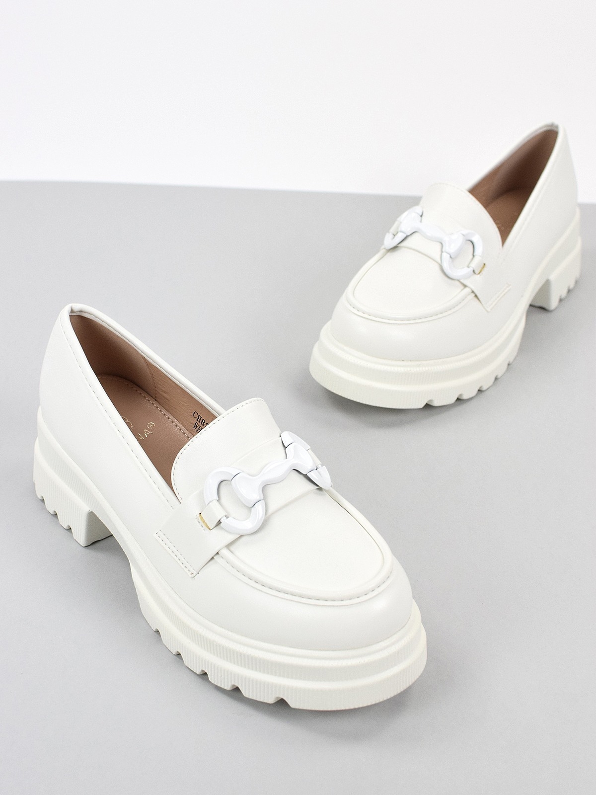 Chunky loafers with front trim in white