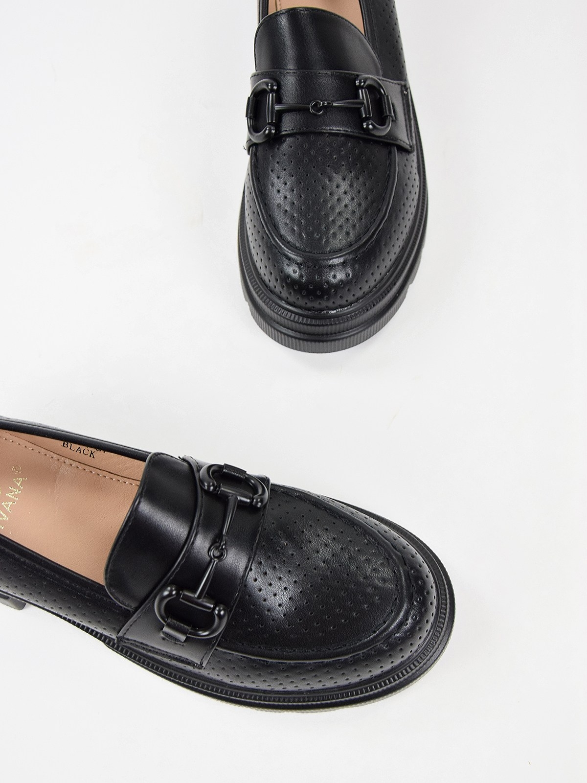 Chunky loafers with front metal trim in black