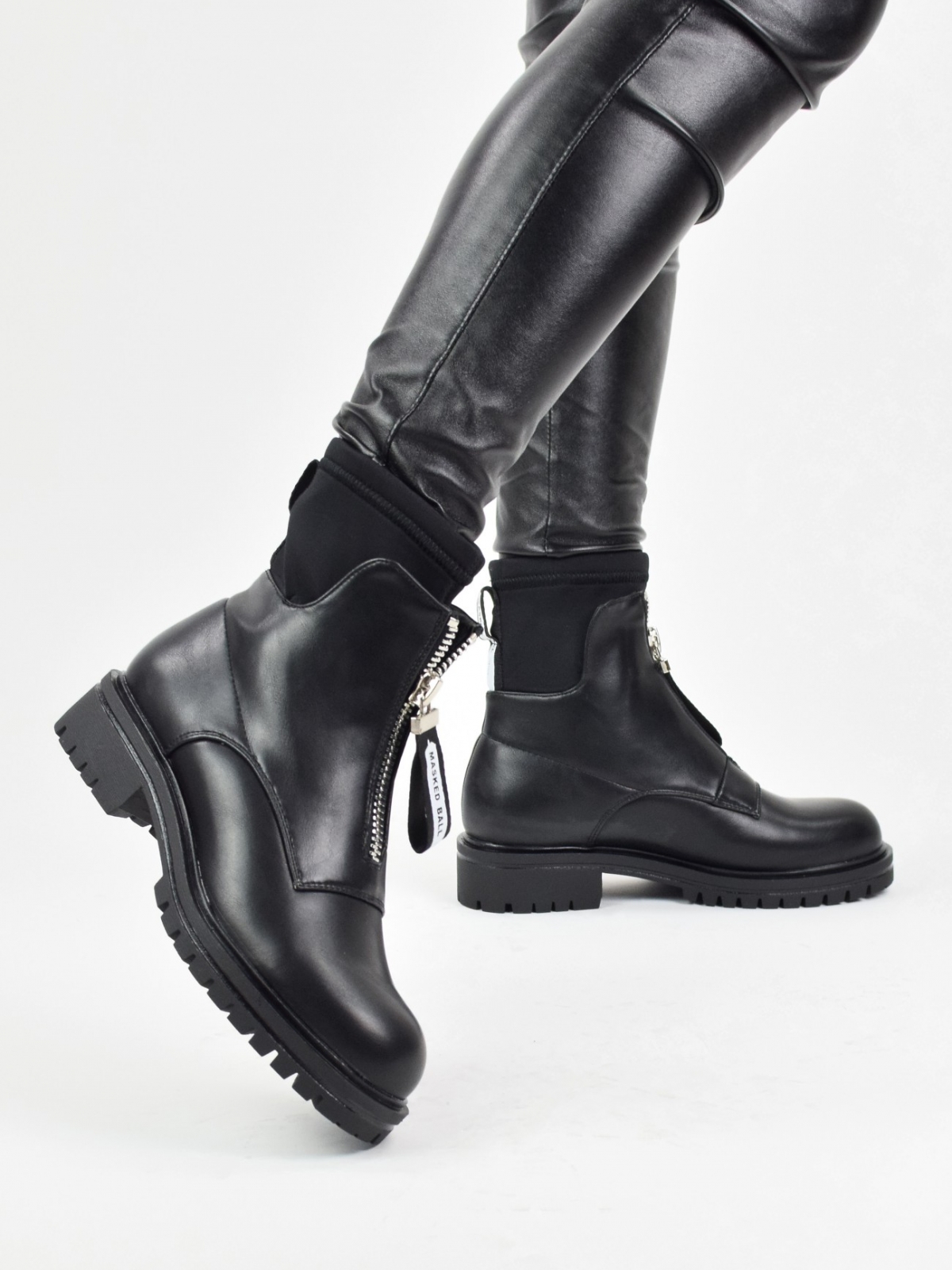 Modern design ankle boots with front zipper in black