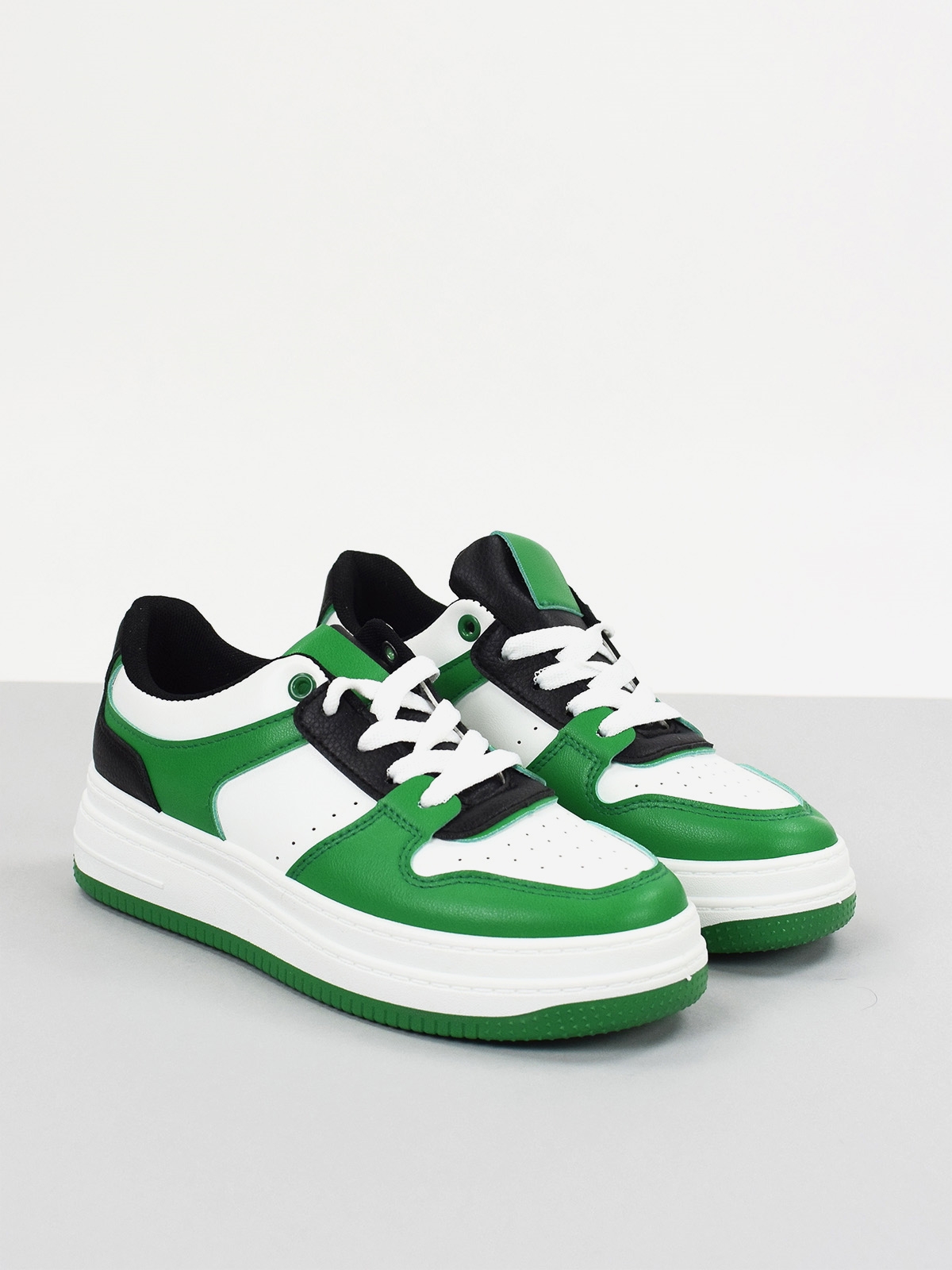 Lace up trainers in green & white