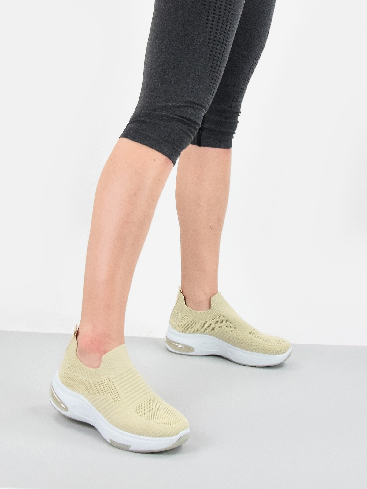 Sock style trainers with white sole in neutral