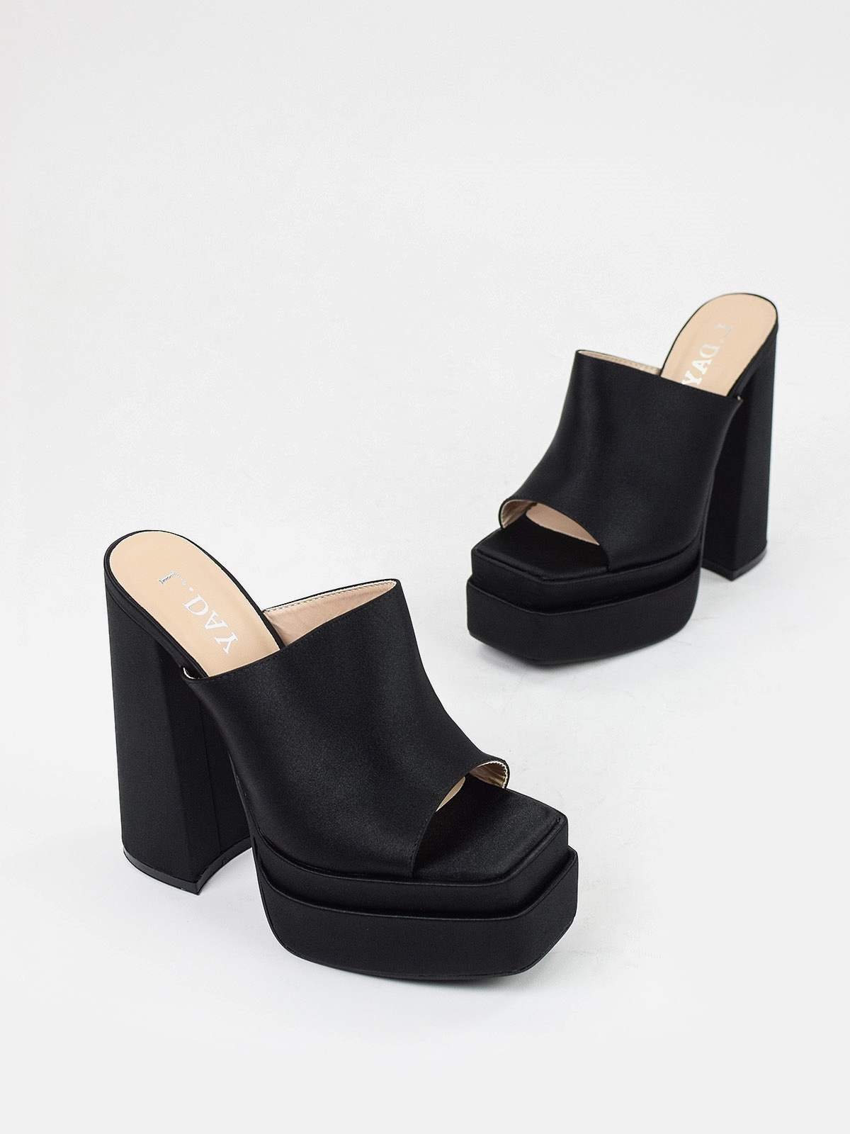 High heeled platform sandals in black