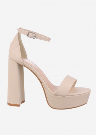 High-heeled sandals in beige