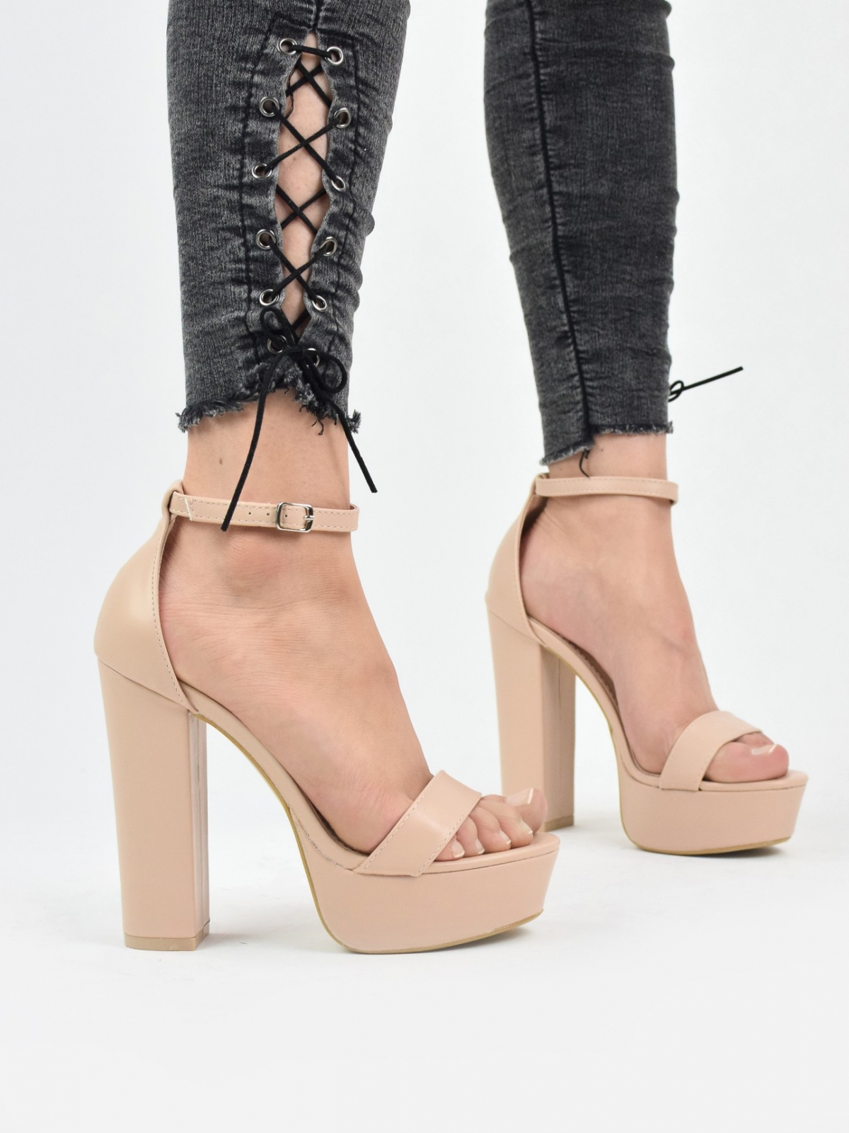Stylish high heeled sandals with stable thick heel in beige