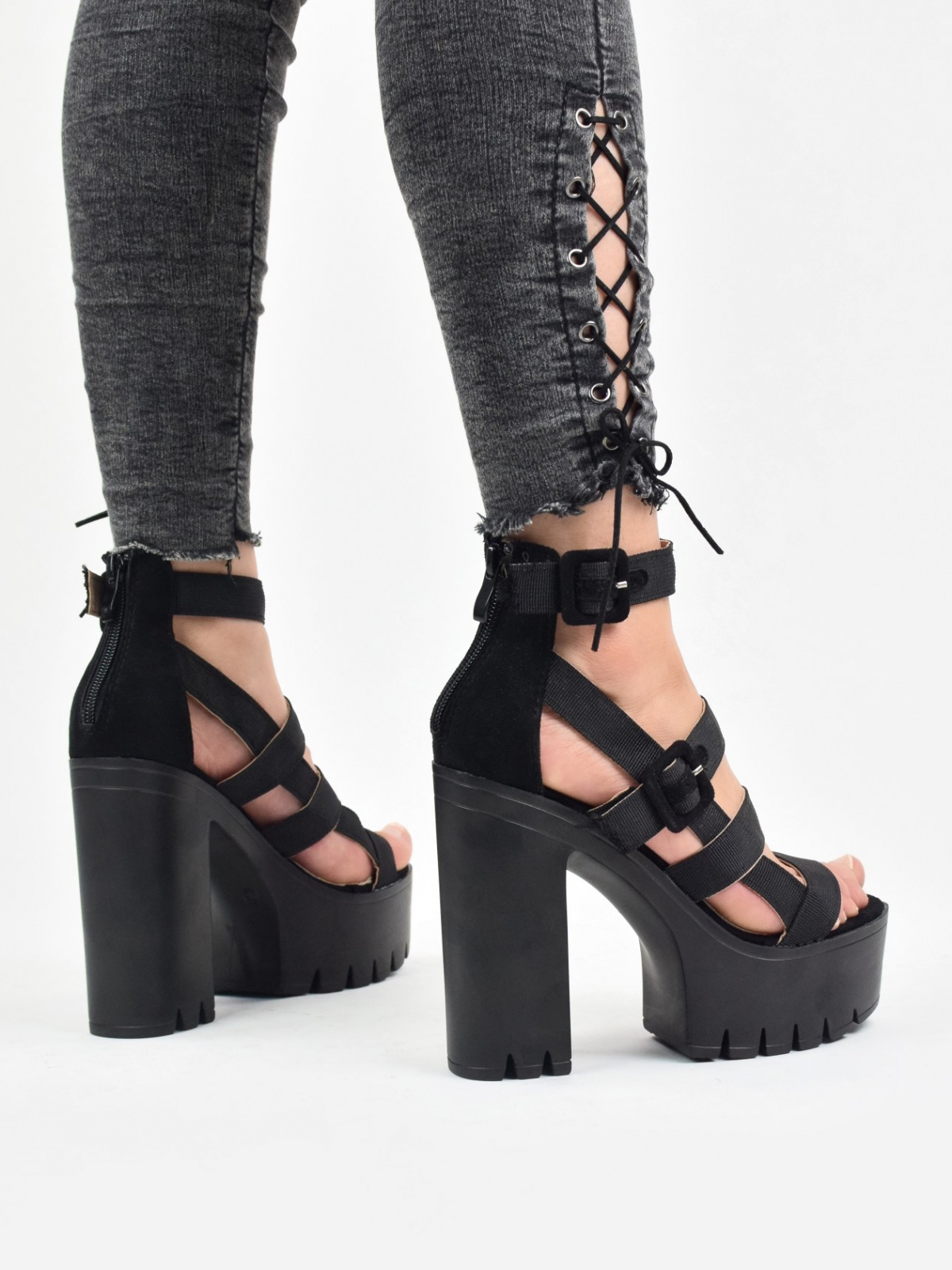 High heeled sandals with fashionable sole in black