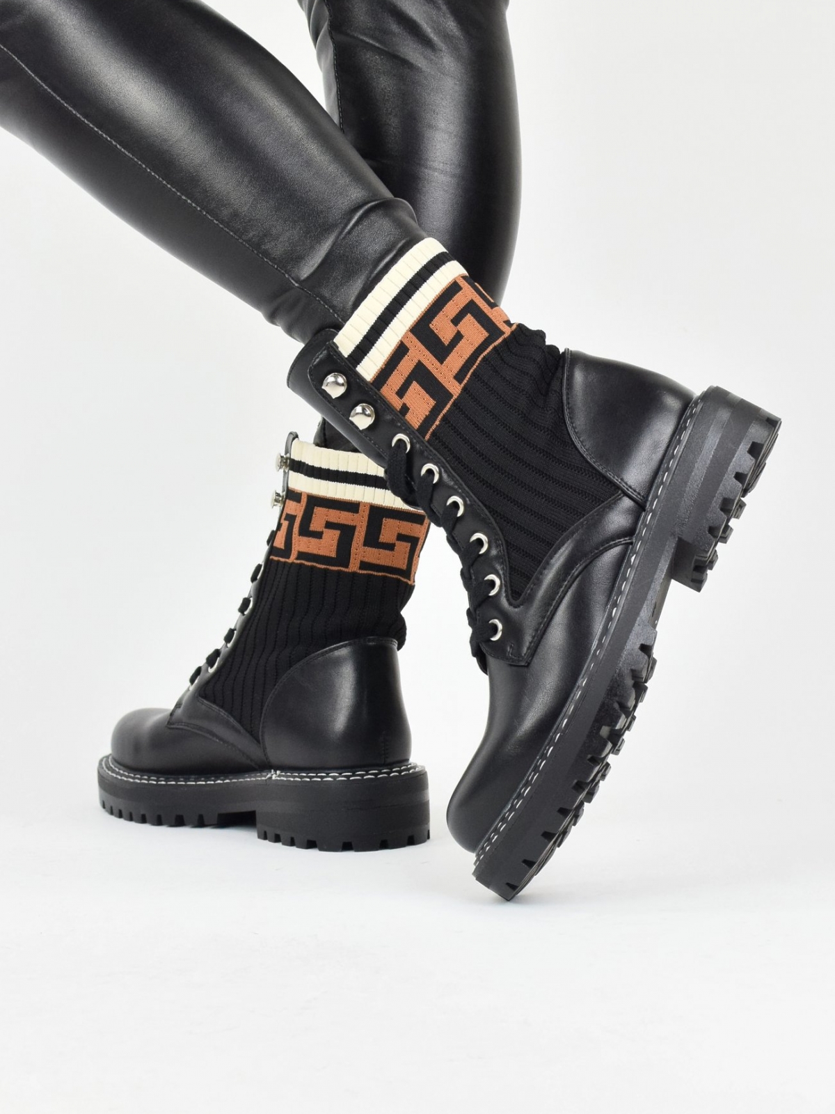 Sock style ankle boots with track sole in black