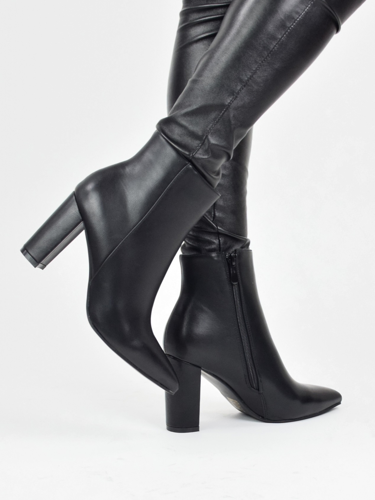 High heeled lace up ankle boots in black