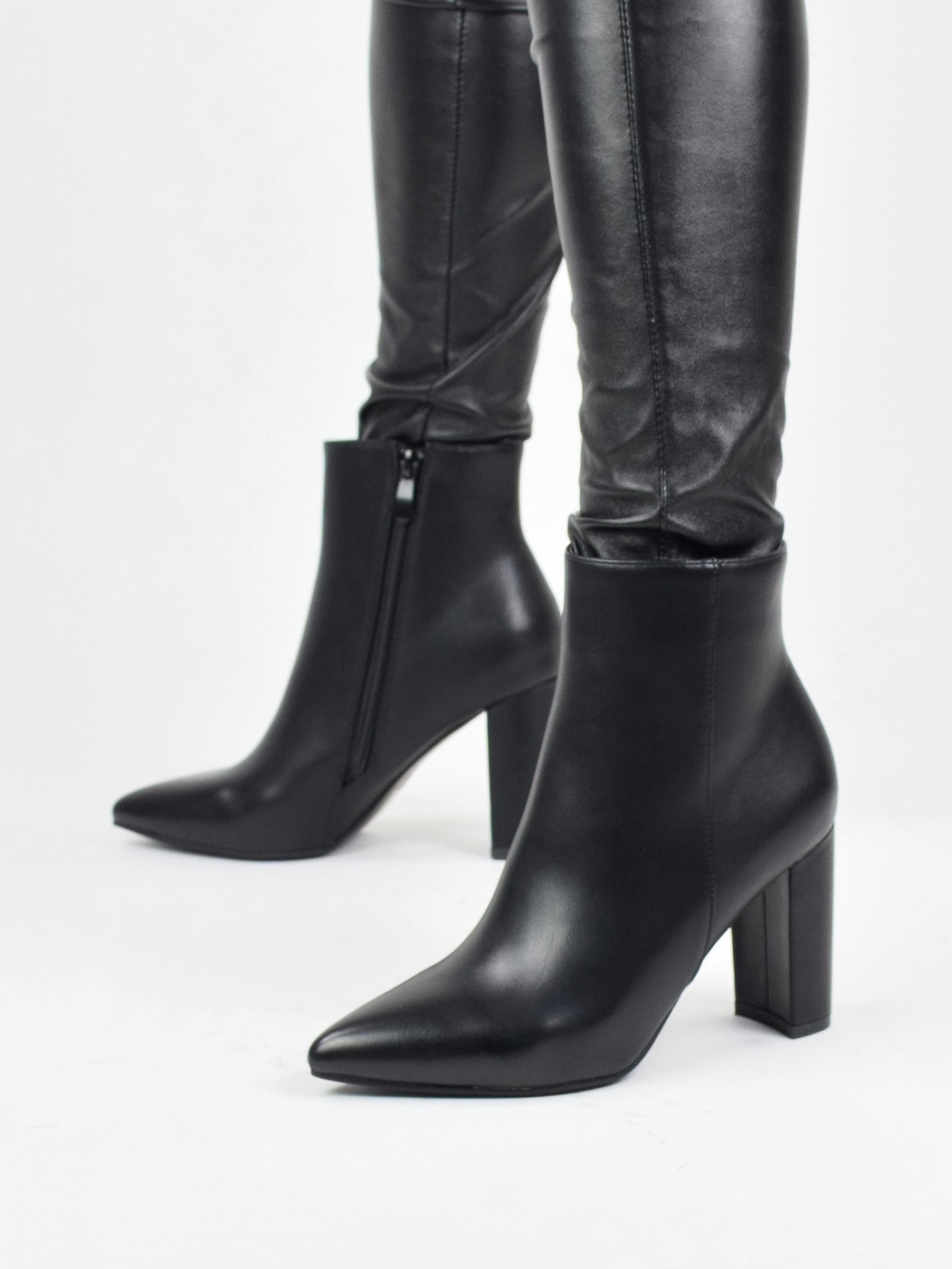 High heeled lace up ankle boots in black