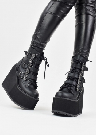 Demonia Swing 103 high platform lace up ankle boots in black