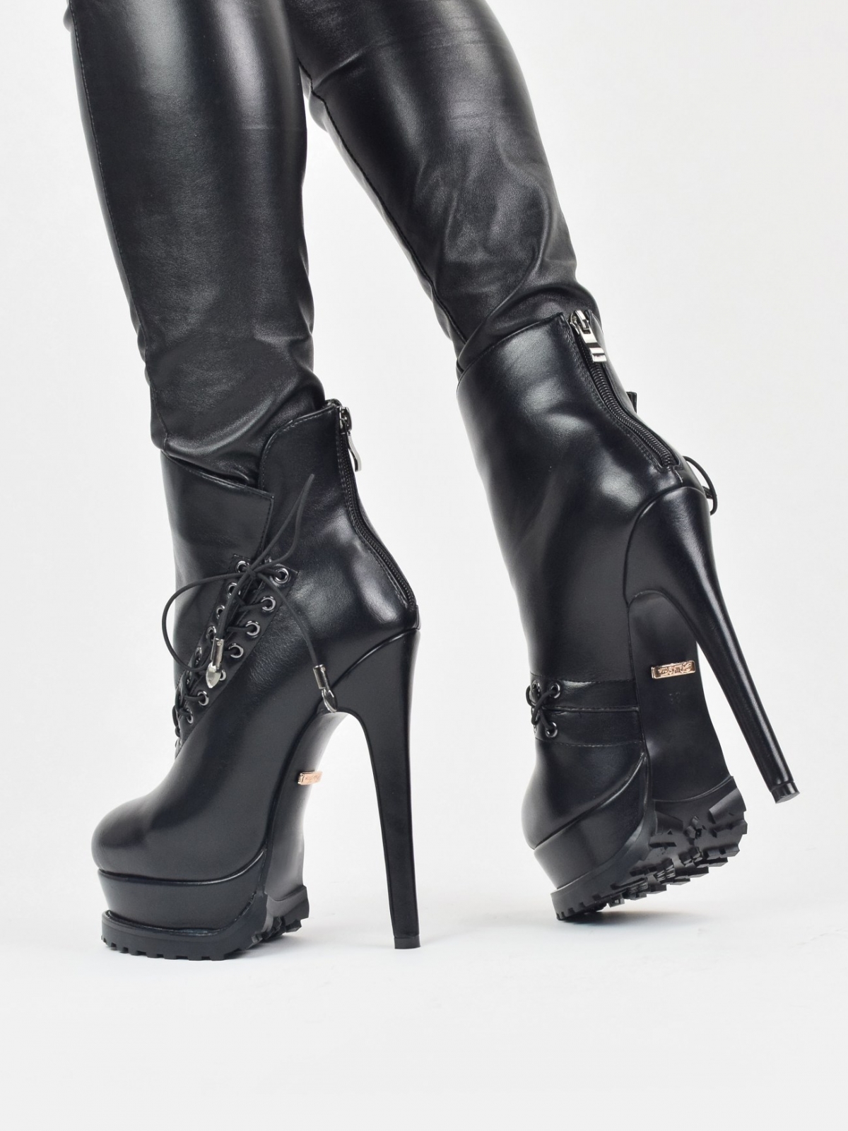 Chunky sole rounded toe high heeled boots in black