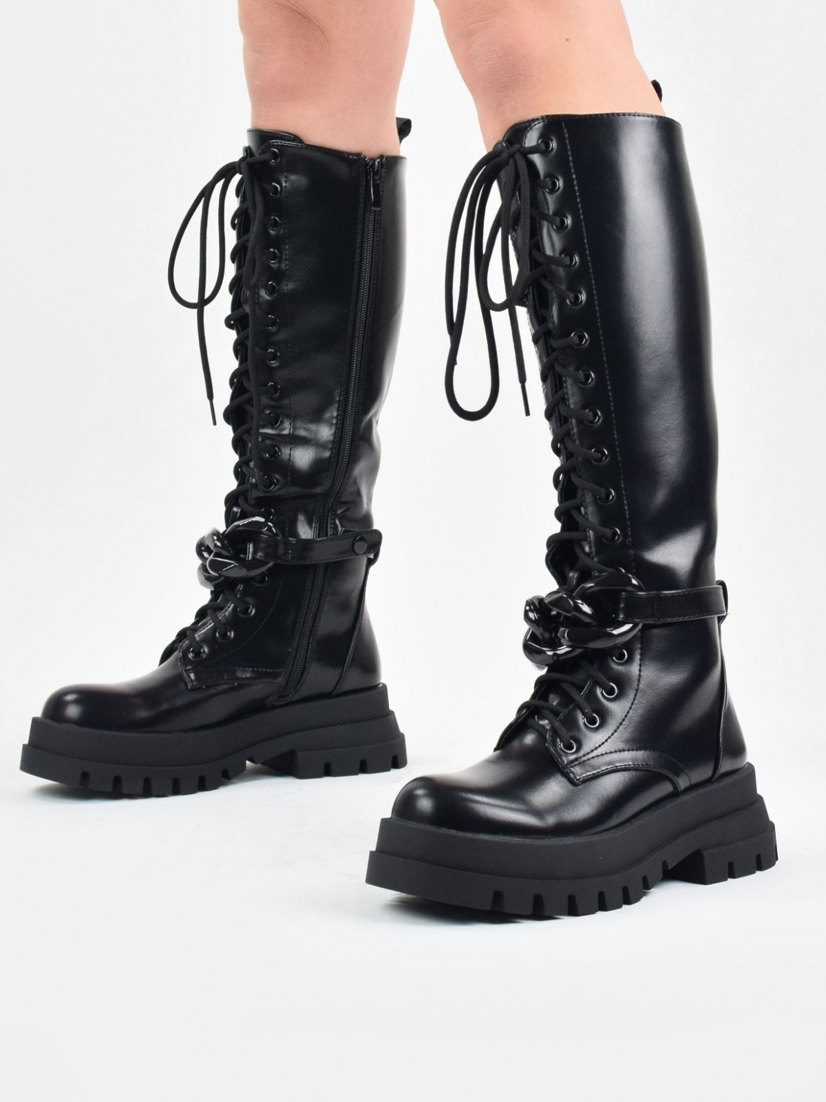 Chunky lace up knee high boots with chain in black