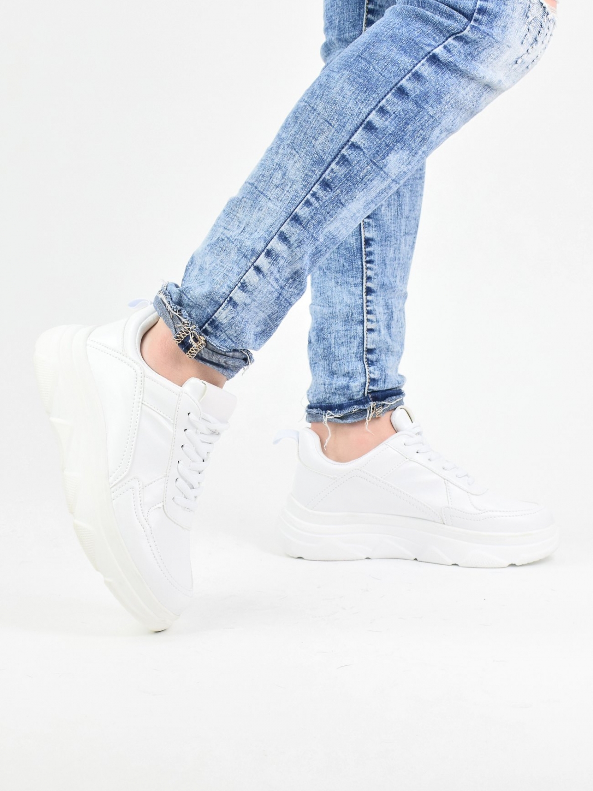 Classic design sneakers with a thick sole in white